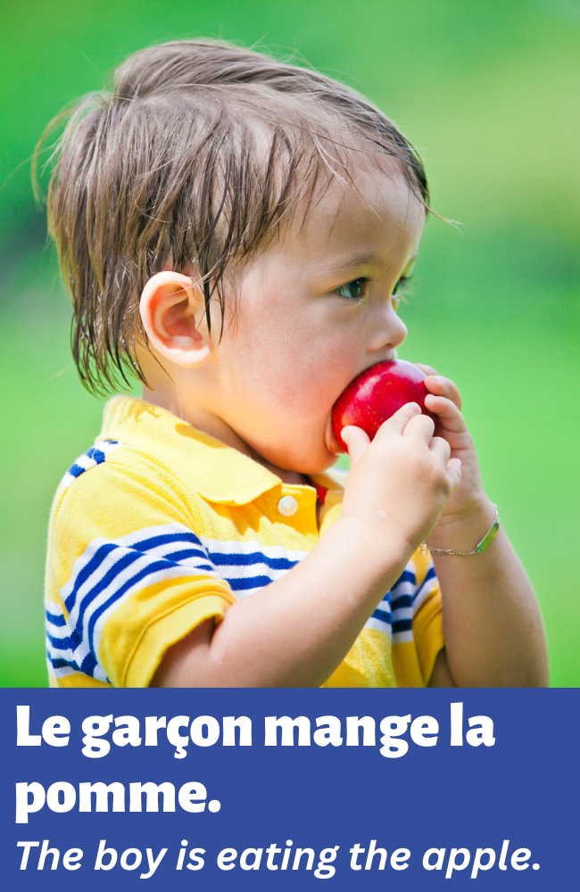 Boy eating apple.