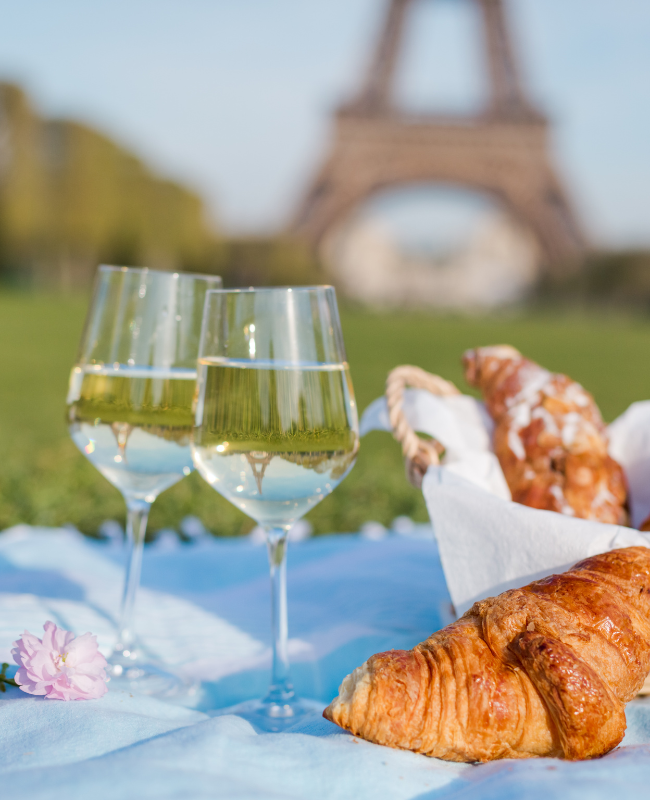 Image of wine and croissants in Paris.